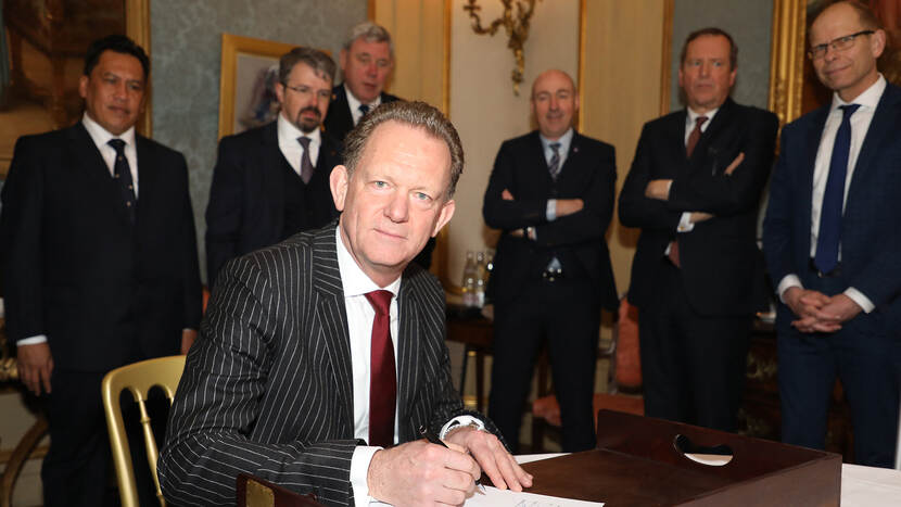 JIT-coordinator and Chief Prosecutor Fred Westerbeke signs the prolongation of the JIT agreement